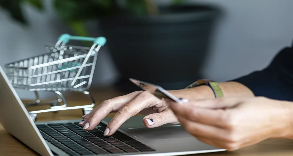 close-up-of-a-woman-hands-buying-online-with-a-cre